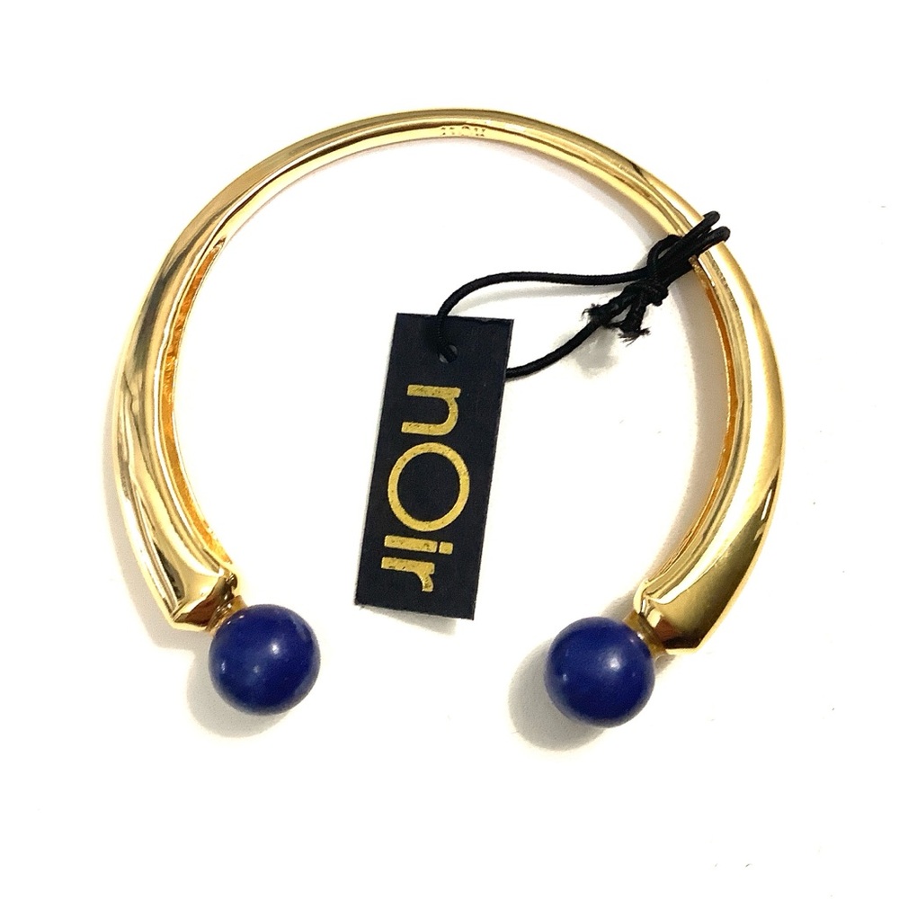 NWT NOIR CUFF BRACELET
Open cuff with blue stone balls 18K gold plating